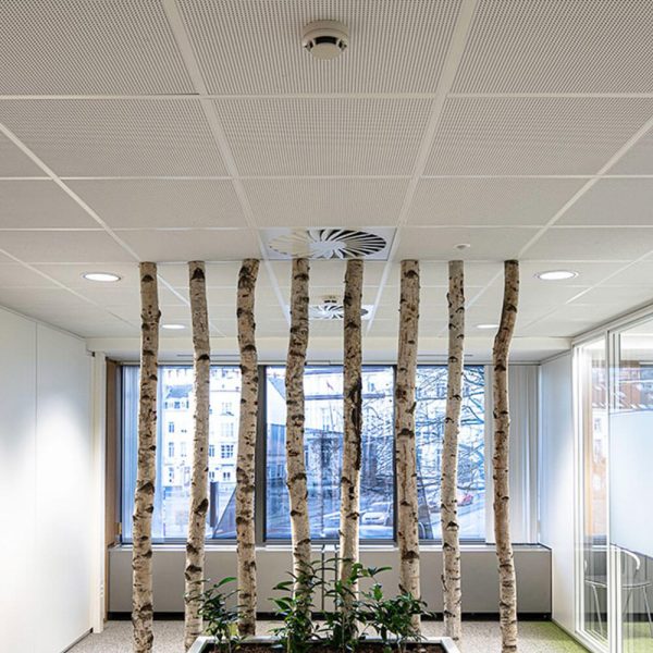 KNAUF Danoline Plaza Plus ceiling panel in white colour micro perforation design at sitting area