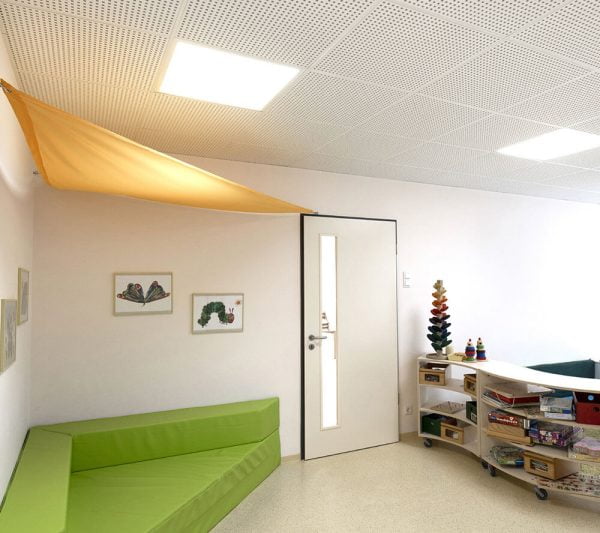 KNAUF Danoline Plaza Plus ceiling panel in a white colour quadril perforation design at kindergarten waiting area
