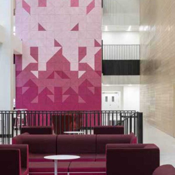 KNAUF Ceiling HERADESIGN® Micro in a dual colour triangle wall panel at the shopping mall