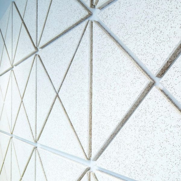 KNAUF Ceiling HERADESIGN® Micro in a triangle shape white colour panel as a square grid layout at the wall