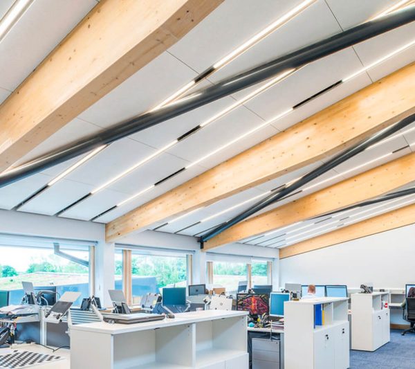 KNAUF Ceiling HERADESIGN® Plano ceiling panel in white colour with light fixtures in large office area