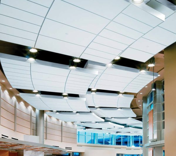 KNAUF Ceiling Armstrong Axiom Clouds ceiling canopy in Classic Edge perimeter design at the hallways of a hospital in a exposed suspension systems