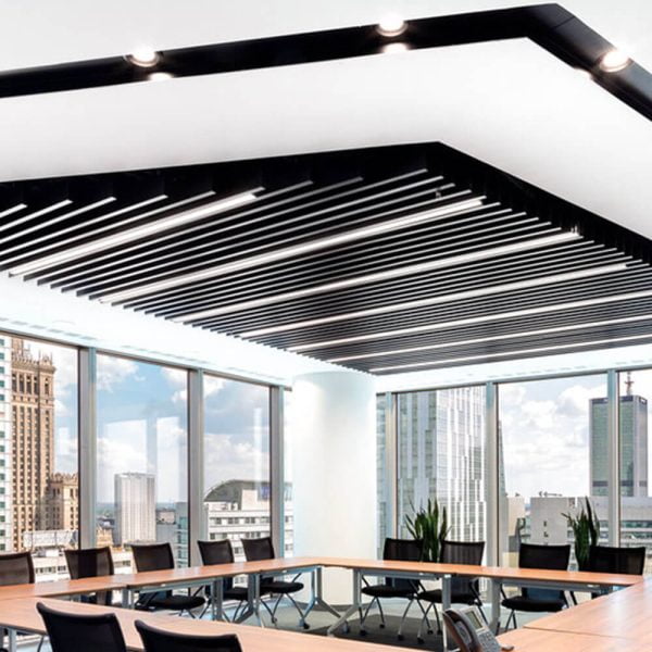 KNAUF Ceiling Armstrong V-P500 Acoustical Baffles planks with a white non perforated panel in meeting room area