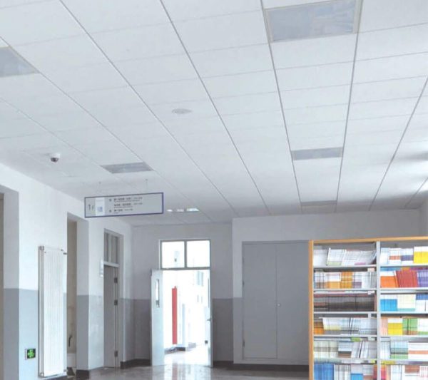 KNAUF Ceiling Armstrong ANF ceiling tiles in white with PeakForm Prelude XL 24 used in a corridor