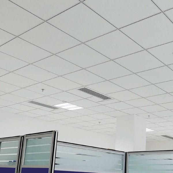 KNAUF Ceiling Armstrong Classic Lite ceiling tiles in a white ceiling with a few cubicles in an office space