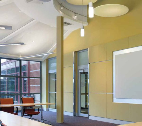 KNAUF Ceiling Armstrong OPTRA Wall Panel in conference room with marmalde orange fabric wall panel in a office sitting area