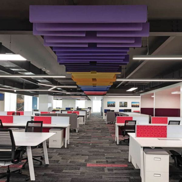 KNAUF Ceiling Armstrong Soundscapes Baffles with a 7 coloured baffles panel linear arrangement in a wide office space