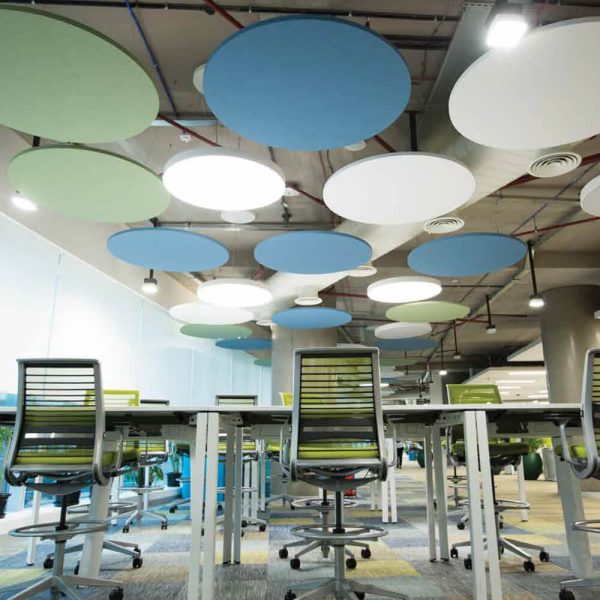 KNAUF Ceiling Armstrong SoundScapes Shapes with a circle white, blue and green 9-panel group layout panel ceiling in a large open space