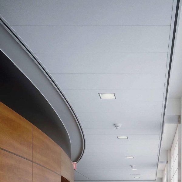 KNAUF Ceiling Armstrong Ultima in a hallway with curved ceilings and wooden walls