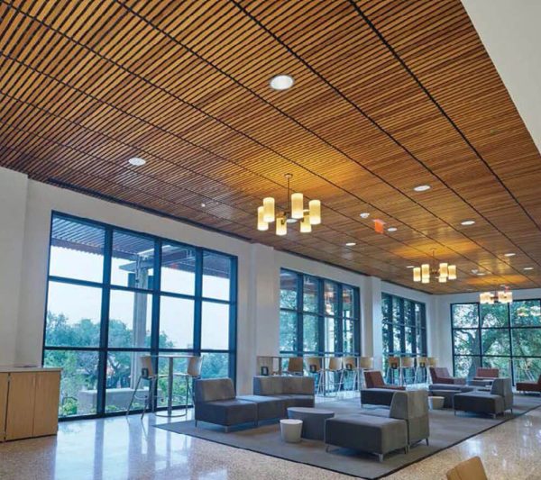 KNAUF Ceiling Armstrong WoodWorks Grille ceiling tiles installed in horizontal slats at a seating area.