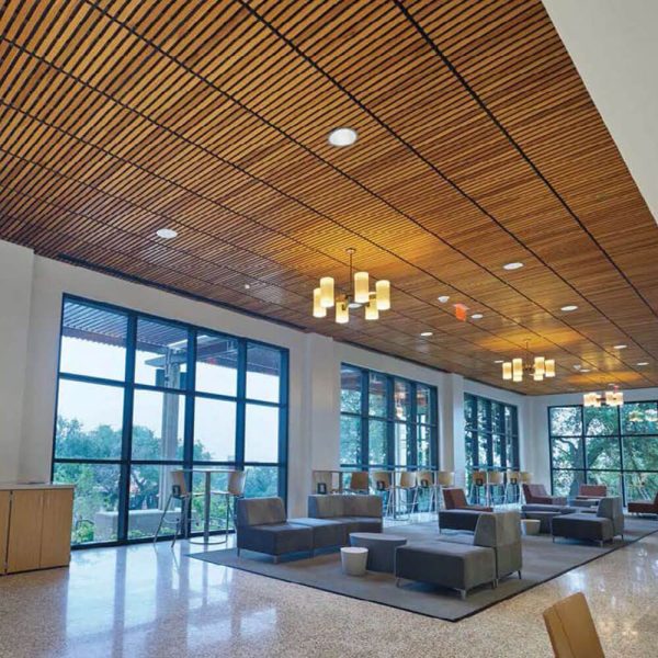 KNAUF Ceiling Armstrong WoodWorks Grille ceiling tiles installed in horizontal slats at a seating area.