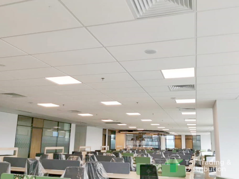 TSI Trading commercial project using KNAUF Ceiling Solutions Armstrong Dune Max in white colour ceiling tiles with fully wrapped furnitures