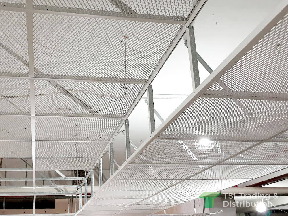 A white metal mesh ceiling with grids