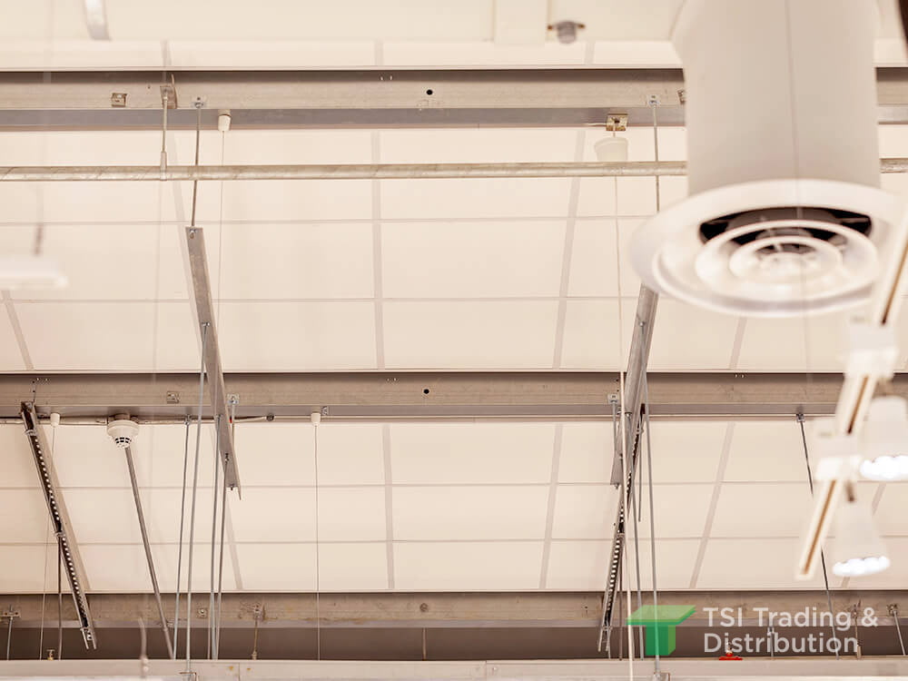 Ventilation system with metal bars and pvc pipes using a industrial quality ceiling tiles
