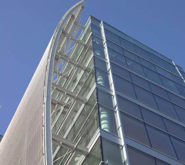 GKD Futura 3110 flexible architectural mesh for a curved facade on medical centre building exterior