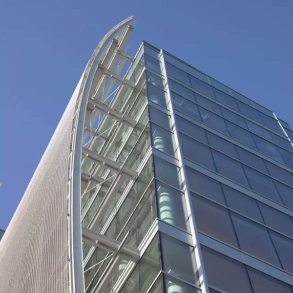 GKD Futura 3110 flexible architectural mesh for a curved facade on medical centre building exterior